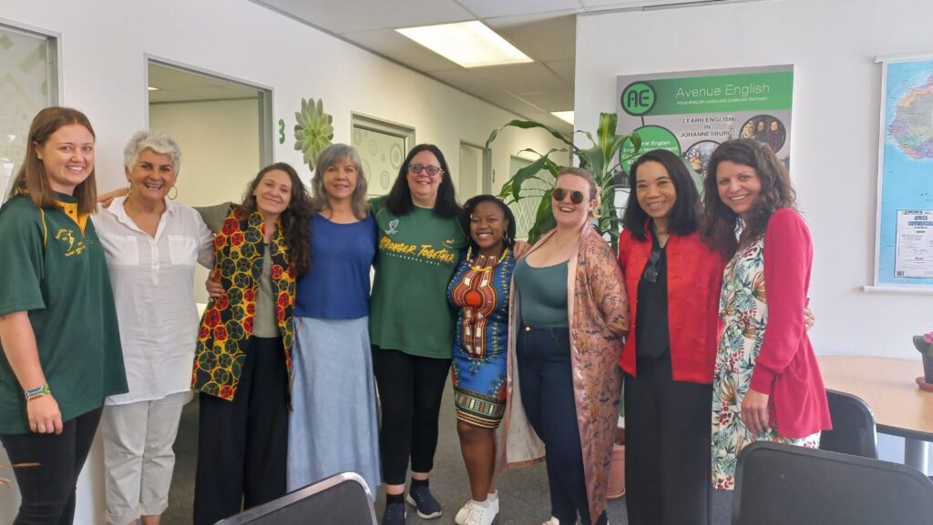 Group shot of nine English Language teachers at Avenue English Language School, Cape Town, South Africa